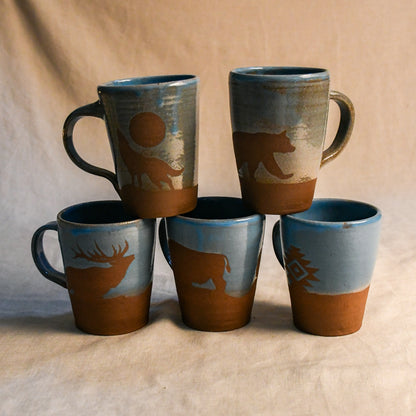 Wild Rojo 5-mug set in turquoise with 5 original designs of a bison, elk, aztec, wolf, and bears.