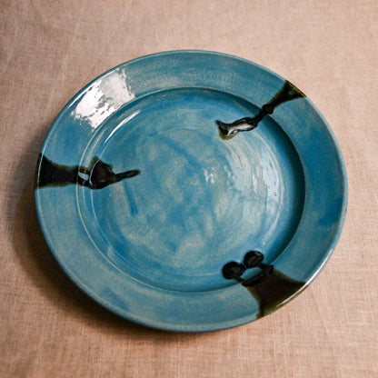 Turquoise handmade wheelthrown pottery dinner plate from the 5th Buffalo collection by Leigh Art
