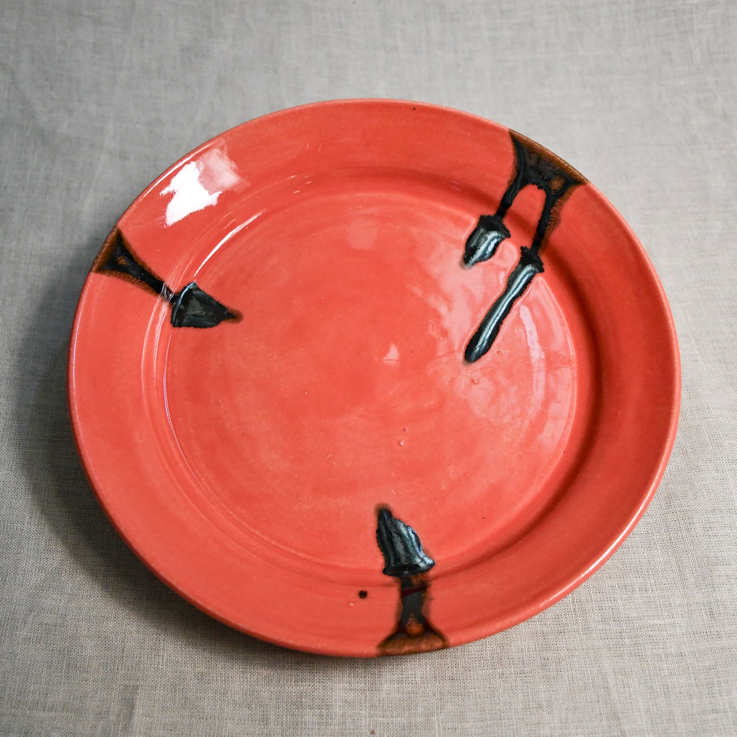 Coral handmade wheelthrown pottery dinner plate from the 5th Buffalo collection by Leigh Art