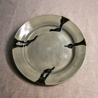 Grey handmade wheelthrown pottery dinner plate from the 5th Buffalo collection by Leigh Art