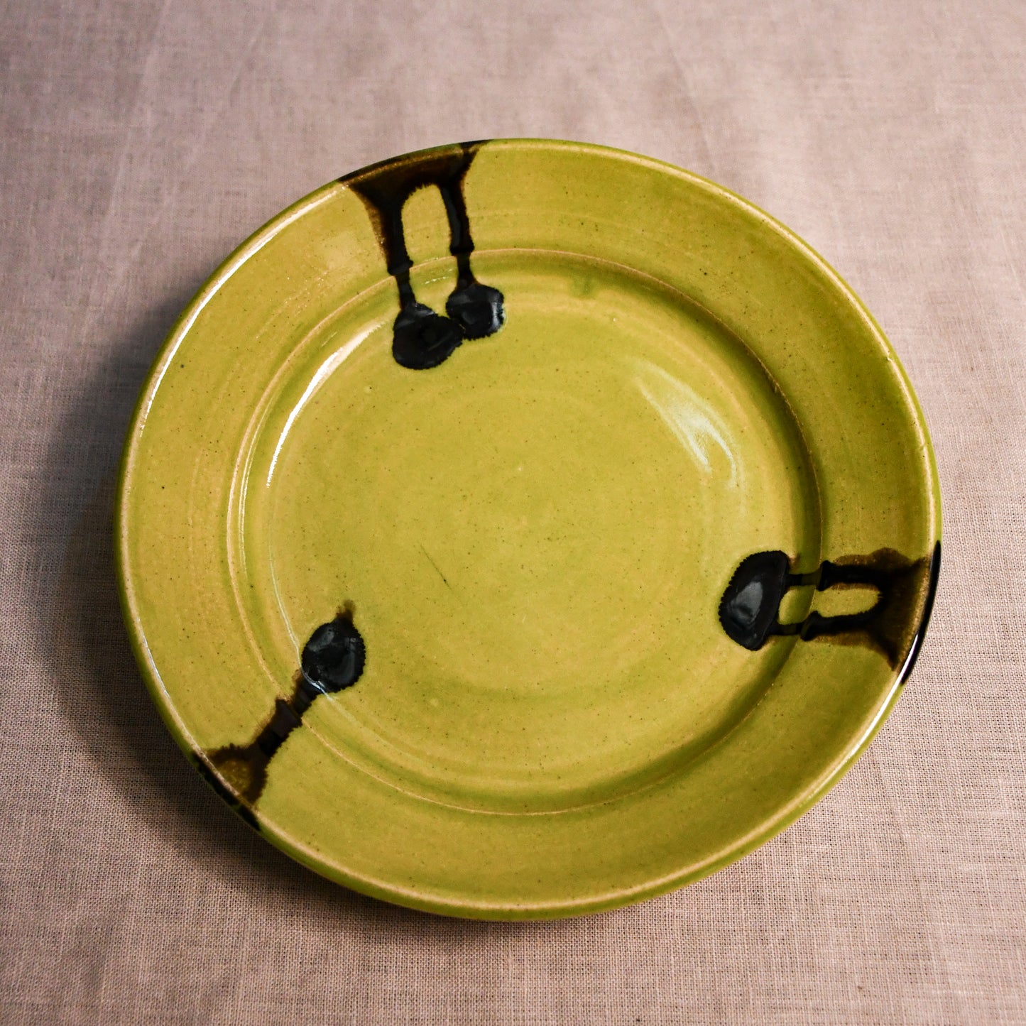 Lime Green handmade wheelthrown pottery dinner plate from the 5th Buffalo collection by Leigh Art