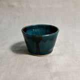 Dark teal handmade wheelthrown salsa bowl with black drips from the 5th Buffalo collection by Leigh Art.
