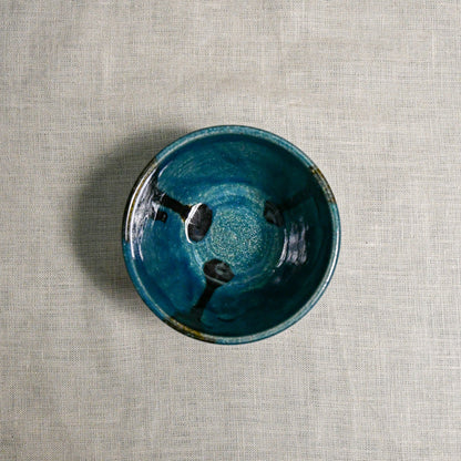 Interior image of a dark teal handmade wheelthrown salsa bowl from the 5th Buffalo collection by Leigh Art.