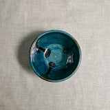 Interior image of a dark teal handmade wheelthrown salsa bowl from the 5th Buffalo collection by Leigh Art.