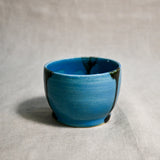 Turquoise handmade wheelthrown salsa bowl with black drips from the 5th Buffalo collection by Leigh Art.