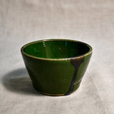 Green handmade wheelthrown salsa bowl with black drips from the 5th Buffalo collection by Leigh Art.