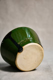 Green handmade wheelthrown salsa bowl with black drips from the 5th Buffalo collection by Leigh Art.
