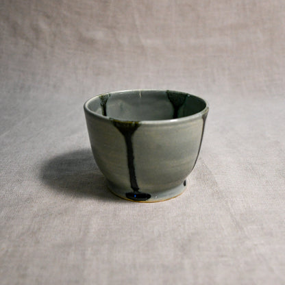 Grey handmade wheelthrown salsa bowl with black drips from the 5th Buffalo collection by Leigh Art.