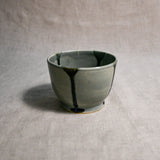 Grey handmade wheelthrown salsa bowl with black drips from the 5th Buffalo collection by Leigh Art.