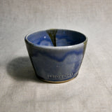 Purple handmade wheelthrown salsa bowl with black drips from the 5th Buffalo collection by Leigh Art.