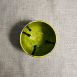 Interior image of a lime green
handmade wheelthrown salsa bowl from the 5th Buffalo collection by Leigh Art.