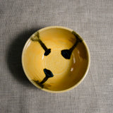 Interior image of a yellow handmade wheelthrown salsa bowl from the 5th Buffalo collection by Leigh Art.