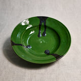 Green handmade wheelthrown pottery saucer from the 5th Buffalo collection by Leigh Art