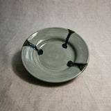 Grey handmade wheelthrown pottery saucer from the 5th Buffalo collection by Leigh Art