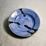 Purple handmade wheelthrown pottery saucer from the 5th Buffalo collection by Leigh Art