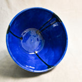 Interior image of a blue handmade wheelthrown serving bowl from the 5th Buffalo collection by Leigh Art.