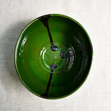 Interior image of a green handmade wheelthrown serving bowl from the 5th Buffalo collection by Leigh Art.