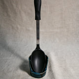 Vertical dark teal handmade spoon rest with serving spoon from the 5th Buffalo collection by Leigh Art