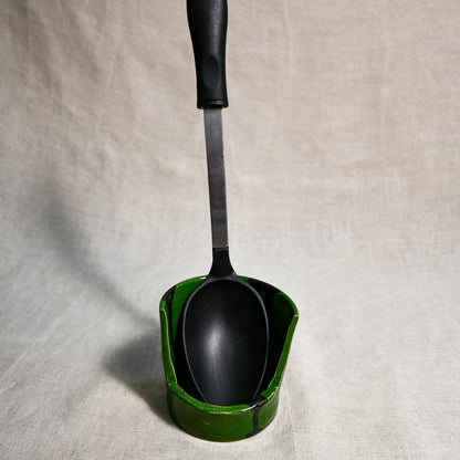 Vertical green handmade spoon rest with serving spoon from the 5th Buffalo collection by Leigh Art