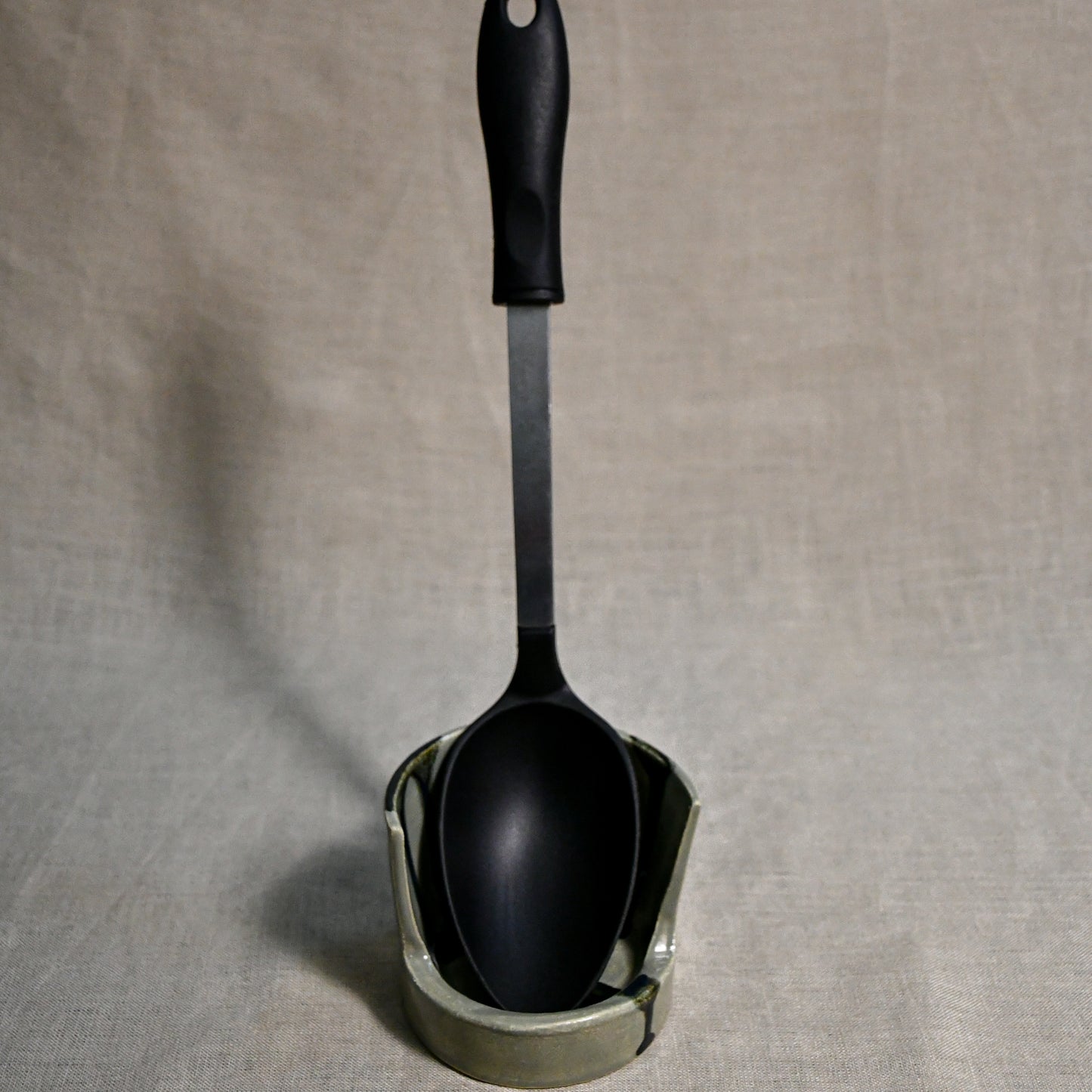 Vertical grey handmade spoon rest with serving spoon from the 5th Buffalo collection by Leigh Art