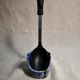 Vertical purple handmade spoon rest with serving spoon from the 5th Buffalo collection by Leigh Art