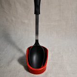 Vertical red handmade spoon rest with serving spoon from the 5th Buffalo collection by Leigh Art