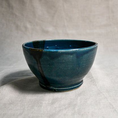Dark teal handmade wheelthrown chili bowl from the 5th Buffalo collection by Leigh Art.