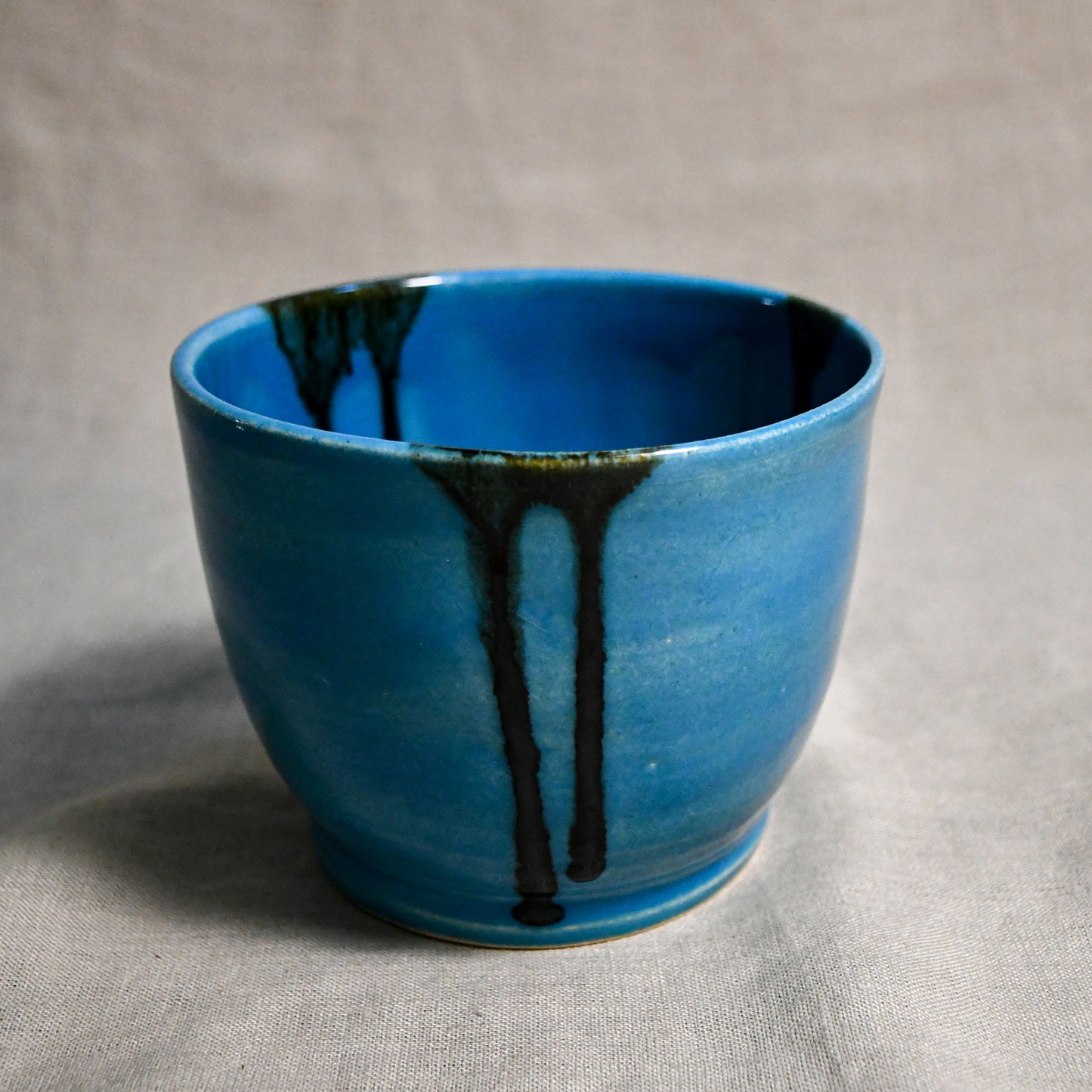 Turquoise handmade wheelthrown chili bowl from the 5th Buffalo collection by Leigh Art.