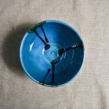Interior image of a turquoise blue handmade wheelthrown chili bowl from the 5th Buffalo collection by Leigh Art.
