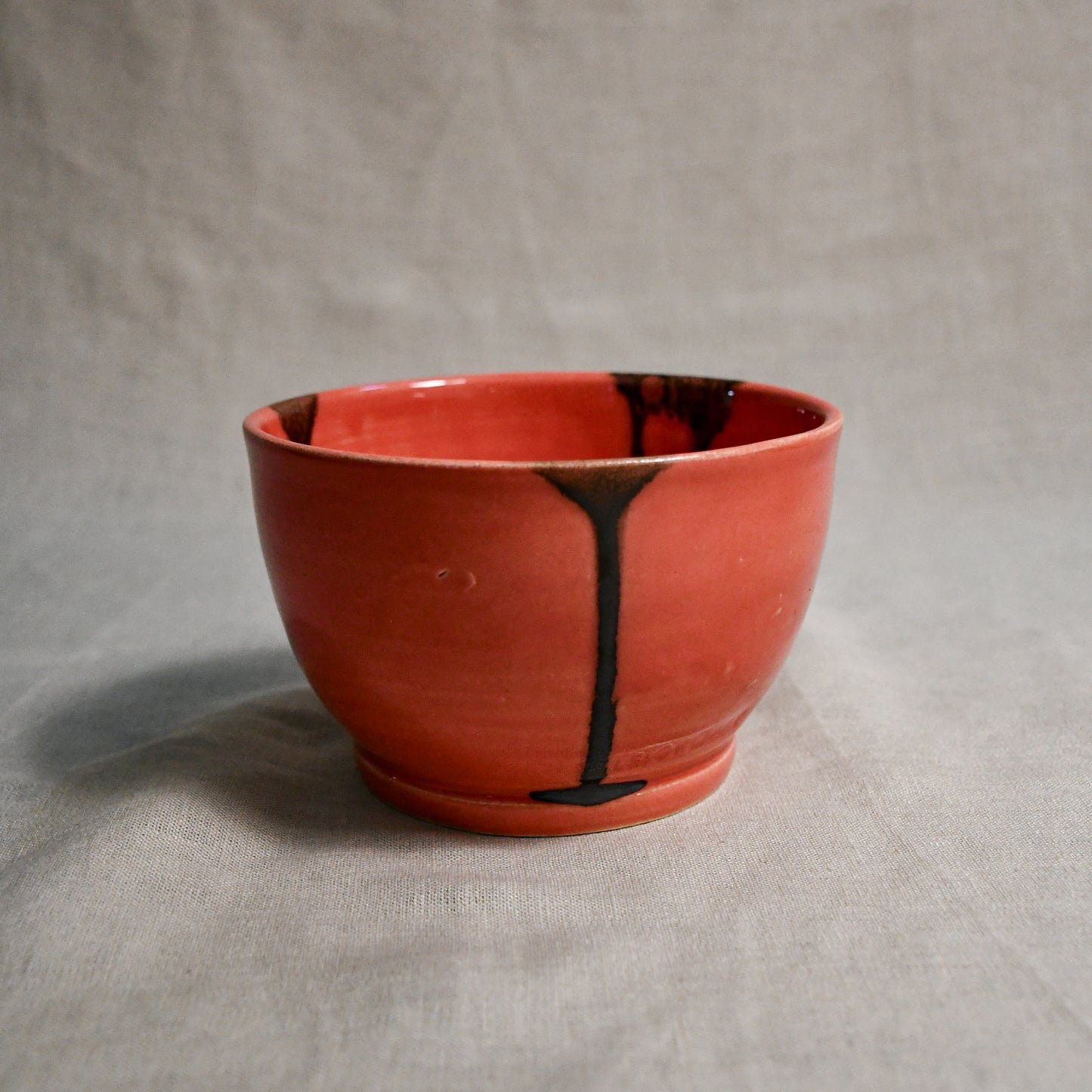 Coral handmade wheelthrown chili bowl from the 5th Buffalo collection by Leigh Art.