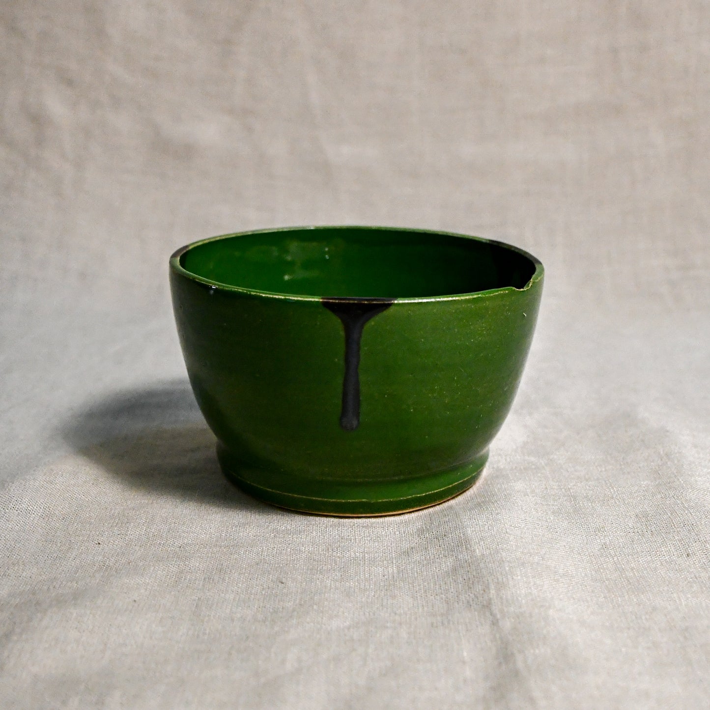Green handmade wheelthrown chili bowl from the 5th Buffalo collection by Leigh Art.