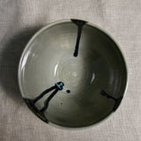Interior image of a grey handmade wheelthrown chili bowl from the 5th Buffalo collection by Leigh Art.
