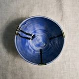 Interior image of a purple handmade wheelthrown chili bowl from the 5th Buffalo collection by Leigh Art.