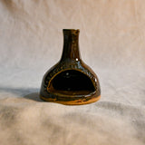 Handmade countertop chiminea, wheel thrown, hand-carved, fit for a tea light and glazed in Coffee Bean glaze. 