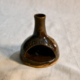 Handmade countertop chiminea, wheel thrown, hand-carved, fit for a tea light and glazed in Coffee Bean glaze. 