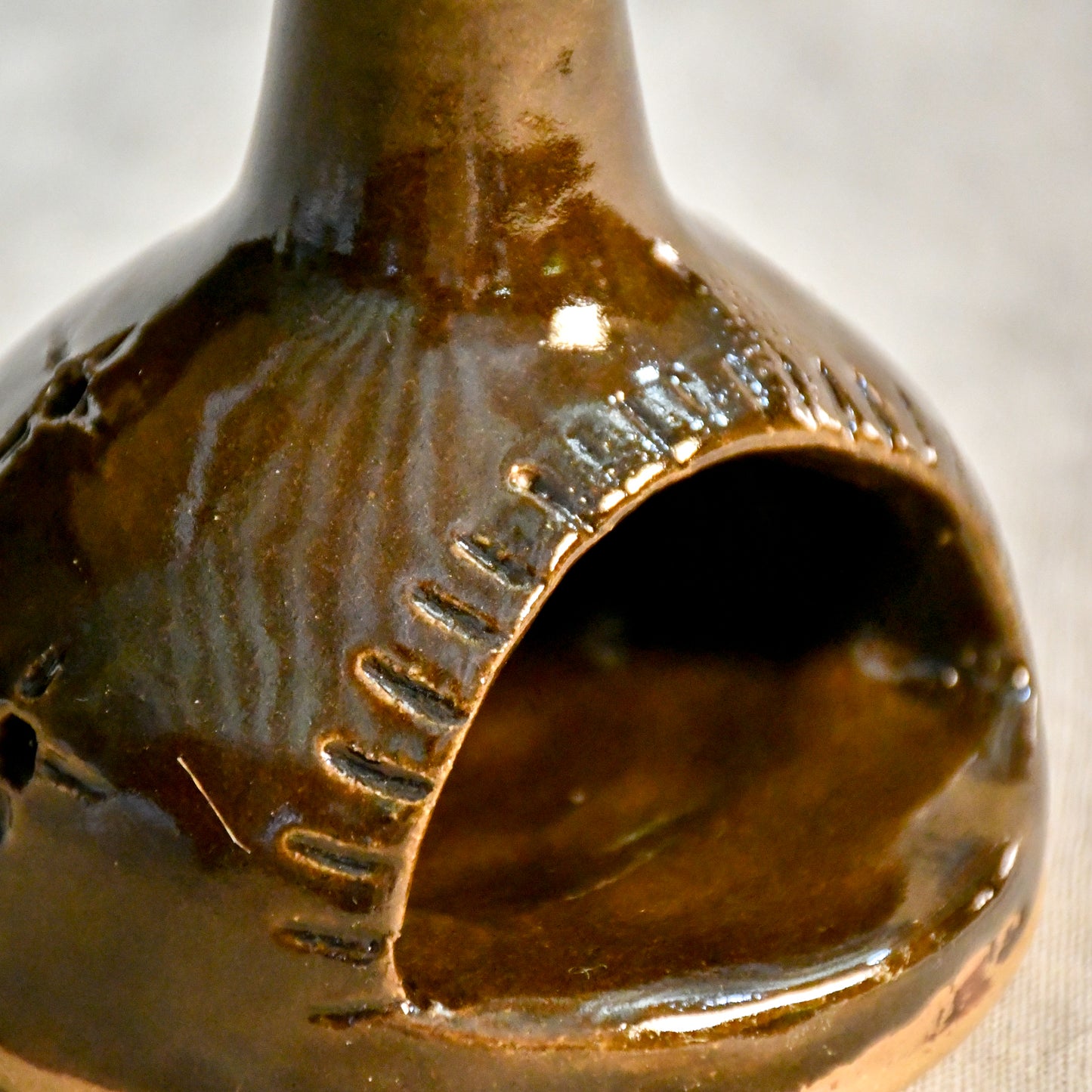 Handmade countertop chiminea, wheel thrown, hand-carved, fit for a tea light and glazed in Coffee Bean glaze. 