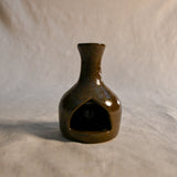 Handmade countertop chiminea, wheel thrown, hand-carved, fit for a tea light and glazed in Coffee Bean glaze. 