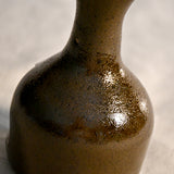 Handmade countertop chiminea, wheel thrown, hand-carved, fit for a tea light and glazed in Coffee Bean glaze. 