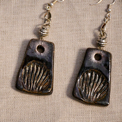 Handmade ceramic stamped dangle earrings by Leigh Art.