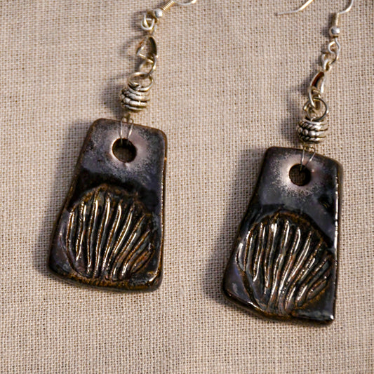 Handmade ceramic stamped dangle earrings by Leigh Art.