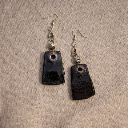 Handmade ceramic stamped dangle earrings by Leigh Art.