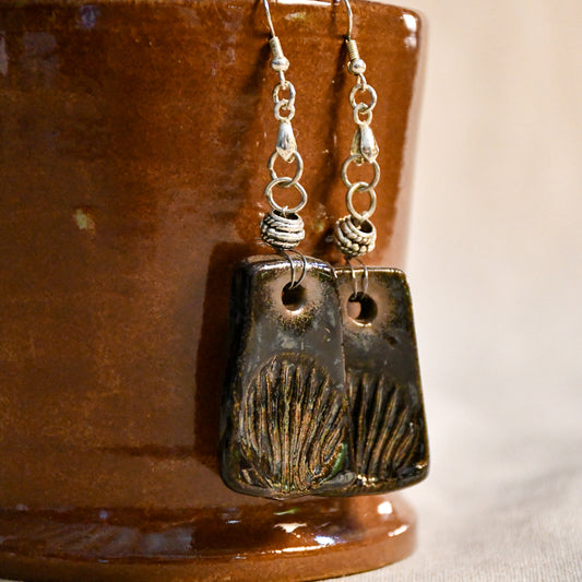 Handmade ceramic stamped dangle earrings by Leigh Art.