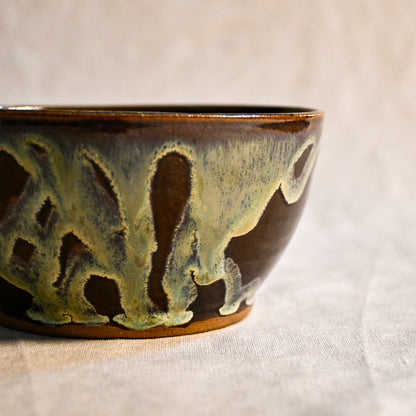 Handmade ceramic chili bowl by Leigh Art featuring Espuela glaze with one-of-a-kind earth-tone movement and wheel-thrown craftsmanship.