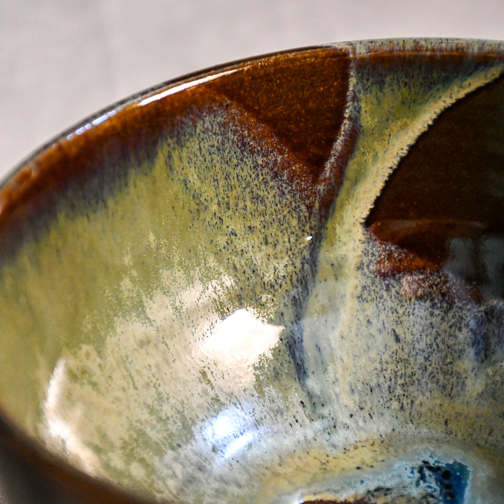 Handmade ceramic chili bowl by Leigh Art featuring Espuela glaze with one-of-a-kind earth-tone movement and wheel-thrown craftsmanship.