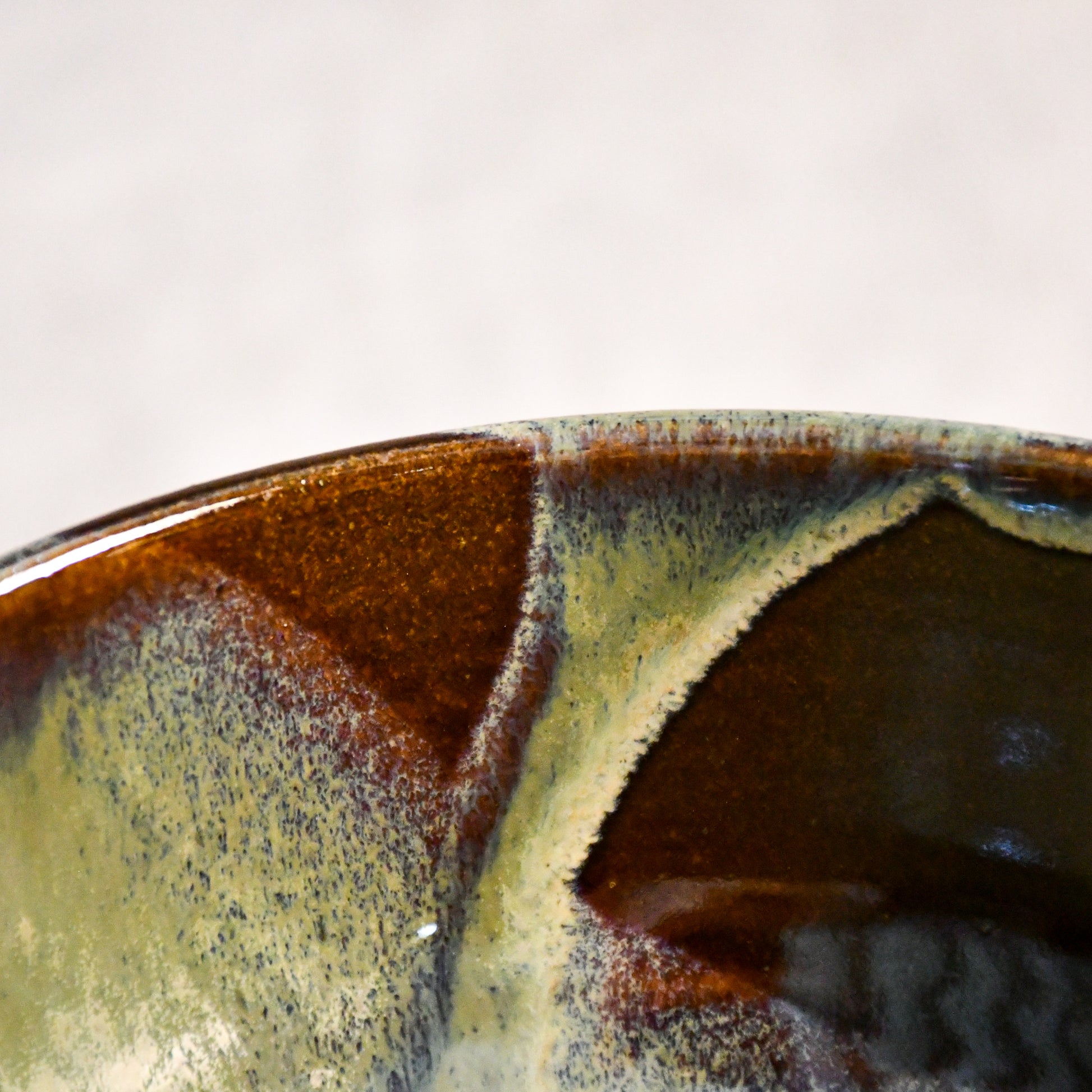 Handmade ceramic chili bowl by Leigh Art featuring Espuela glaze with one-of-a-kind earth-tone movement and wheel-thrown craftsmanship.
