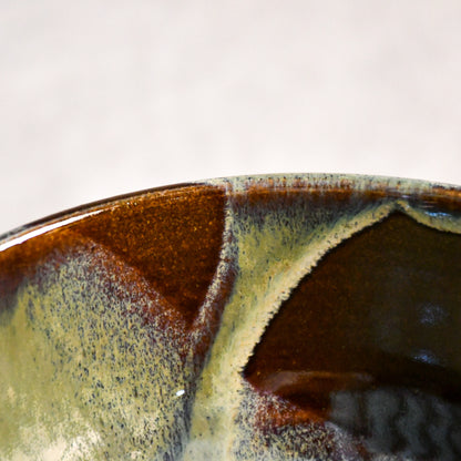 Handmade ceramic chili bowl by Leigh Art featuring Espuela glaze with one-of-a-kind earth-tone movement and wheel-thrown craftsmanship.