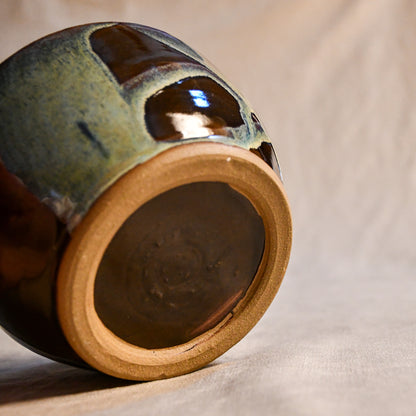 Handmade ceramic chili bowl by Leigh Art featuring Espuela glaze with one-of-a-kind earth-tone movement and wheel-thrown craftsmanship.