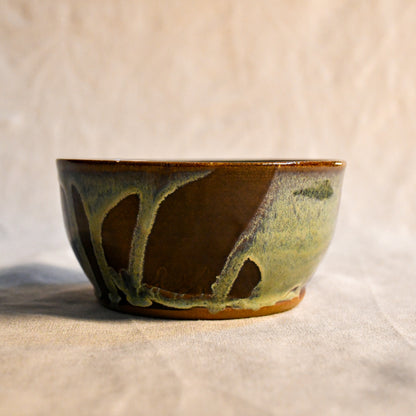 Handmade ceramic chili bowl by Leigh Art featuring Espuela glaze with one-of-a-kind earth-tone movement and wheel-thrown craftsmanship.