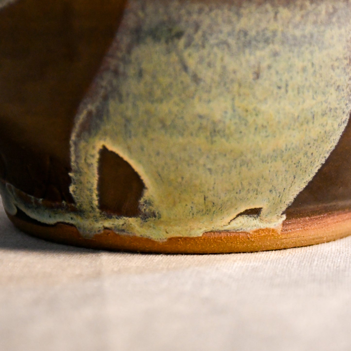 Handmade ceramic chili bowl by Leigh Art featuring Espuela glaze with one-of-a-kind earth-tone movement and wheel-thrown craftsmanship.