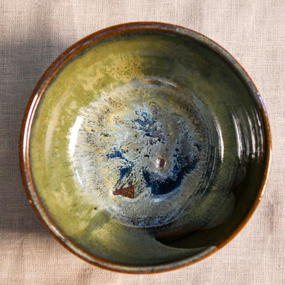 Handmade ceramic chili bowl by Leigh Art featuring Espuela glaze with one-of-a-kind earth-tone movement and wheel-thrown craftsmanship.